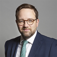 Official portrait of Chris Elmore