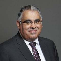 Official portrait of Tahir Ali