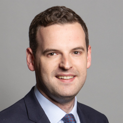 Official portrait of Paul Holmes