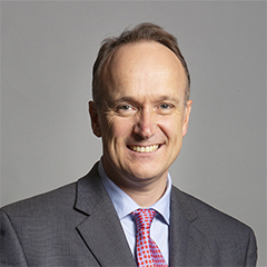 Official portrait of Dr Neil Hudson