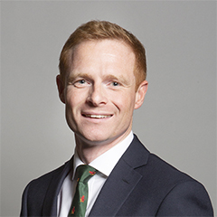 Official portrait of Robbie Moore
