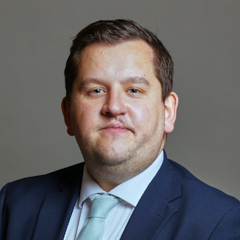 Official portrait of Mr Louie French