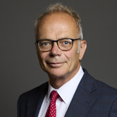 Official portrait of Dr Simon Opher