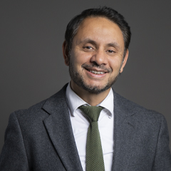 Official portrait of Shockat Adam