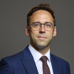 Official portrait of Mr Alex Barros-Curtis