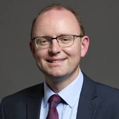 Official portrait of Andrew Cooper