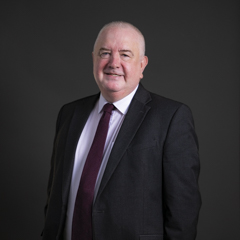 Official portrait of Martin Rhodes