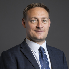 Official portrait of Olly Glover