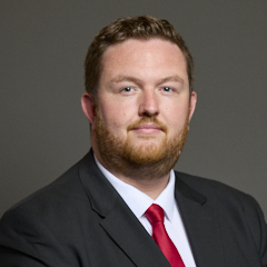Official portrait of Alex McIntyre